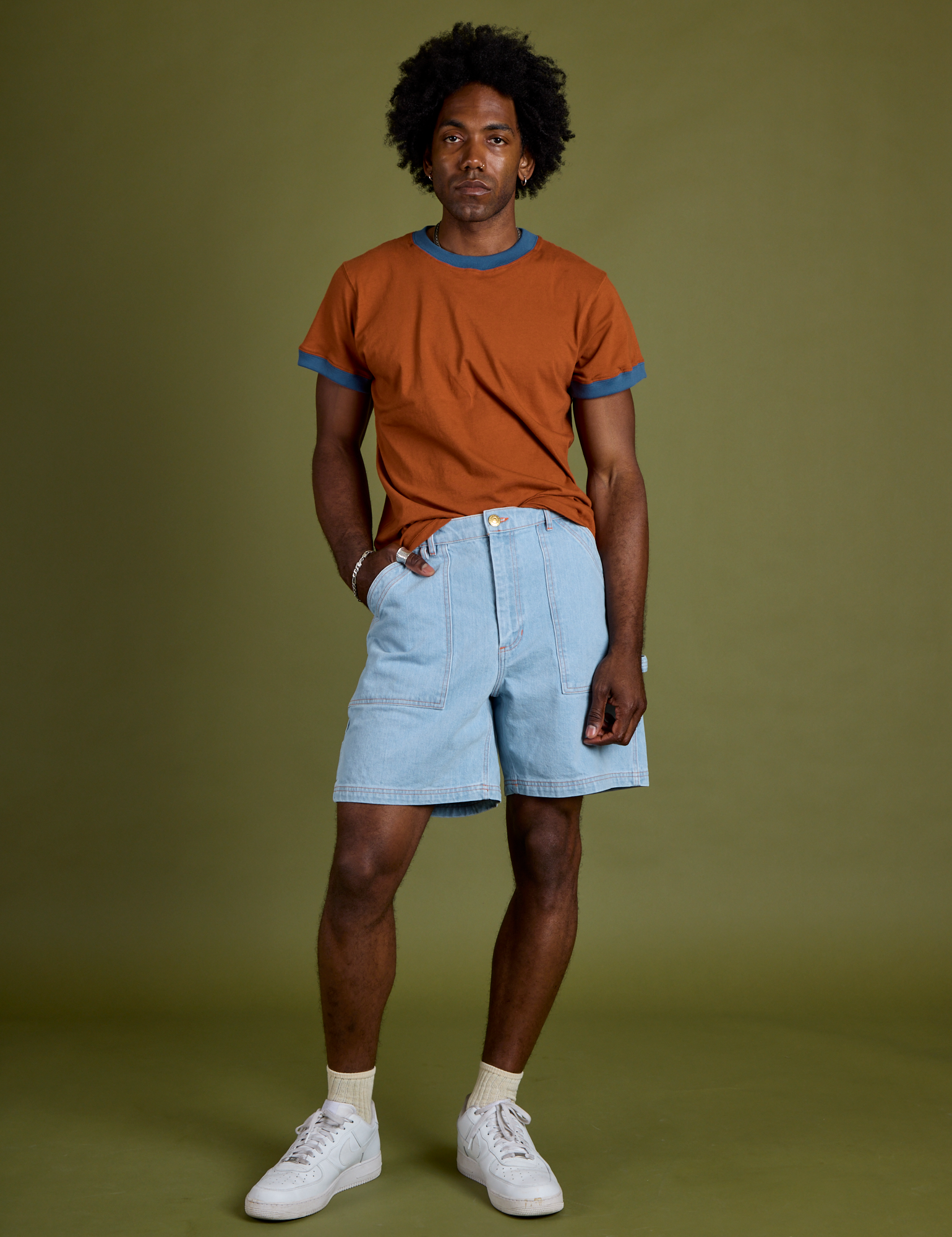 Vintage Ringer Tee in Burnt Terracotta and light wash Carpenter Shorts on Jerrod