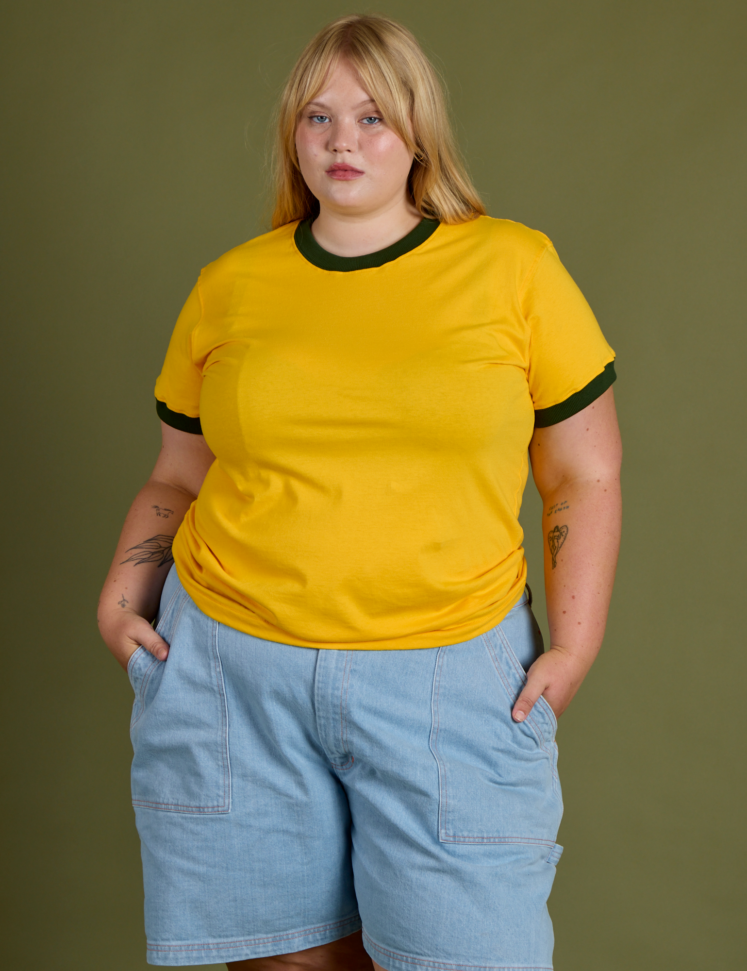 Juliet is 5’7” and wearing L Vintage Ringer Tee in Sunshine Yellow