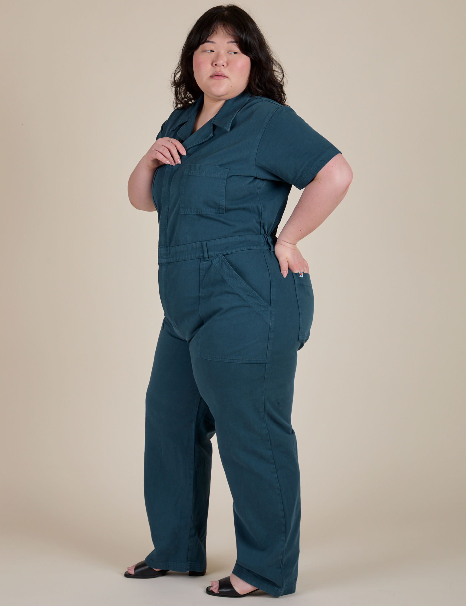 Side view of Short Sleeve Jumpsuit in Lagoon on Ashley
