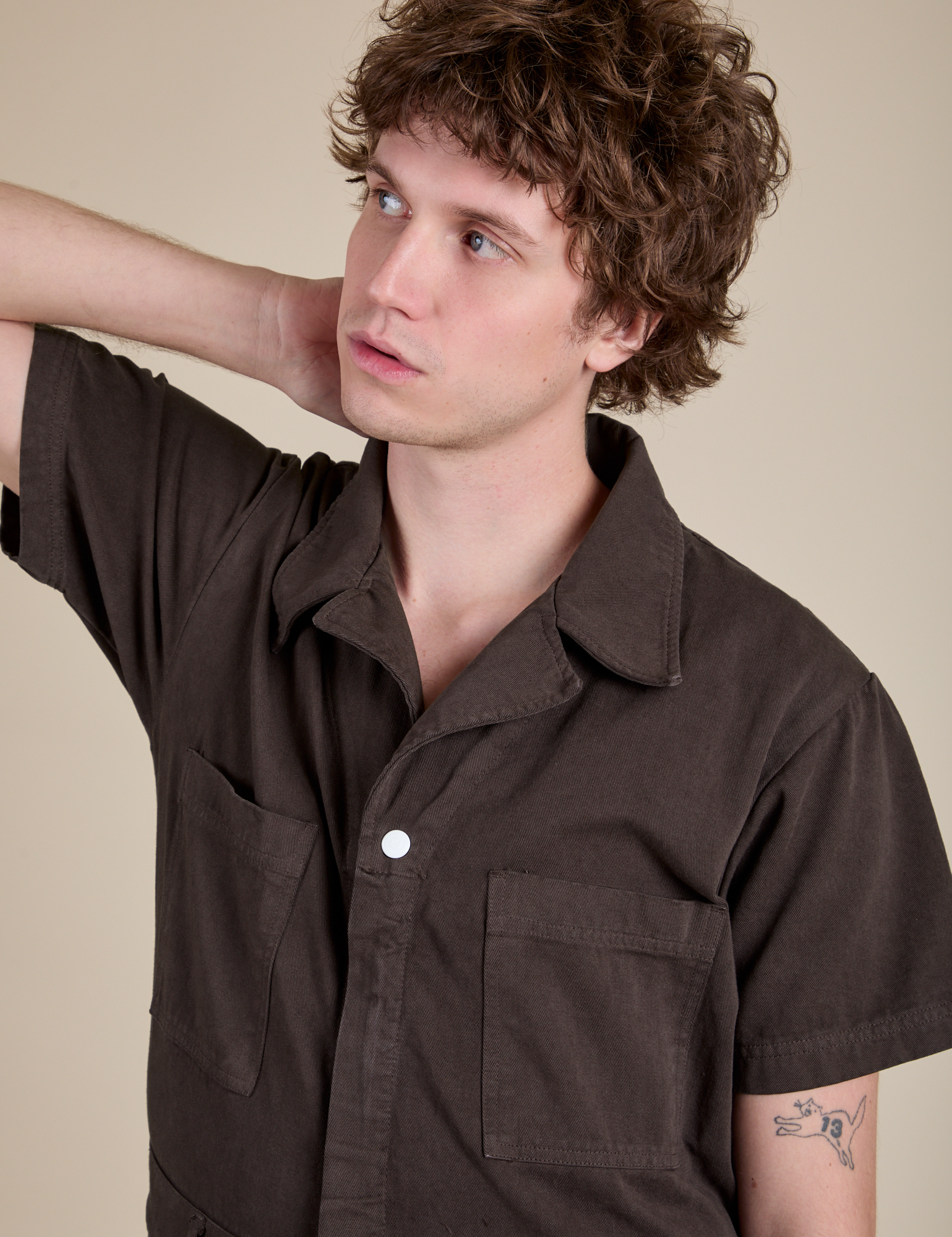 Front close up of Short Sleeve Jumpsuit in Espresso Brown on Quinn