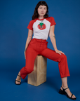 Produce Raglan Tee in Tomato and mustang red Work Pants worn by Alex