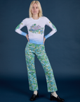 Madeline is wearing Floral Long Sleeve Baby Tee in Baby Blue and Floral Printed Work Pants