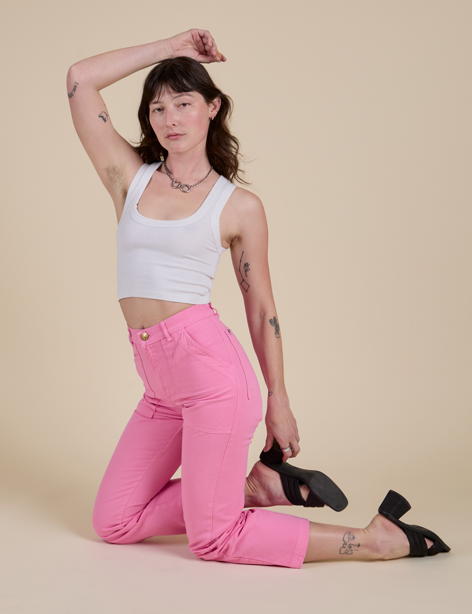 Work Pants in Bubblegum Pink and Cropped Tank in Vintage Tee White on Alex
