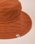 Wide Brim Denim Bucket Hats in Burnt Terracotta Close up