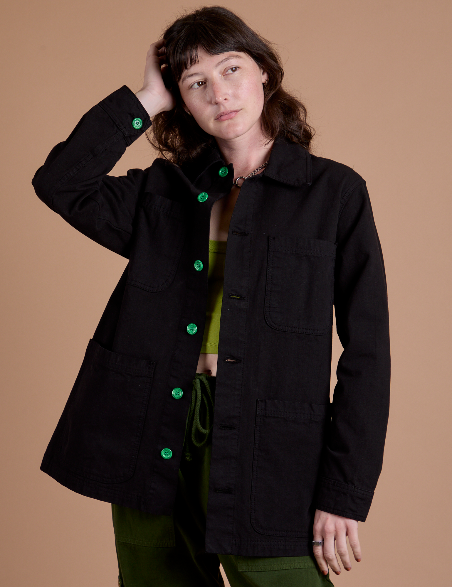 Alex is 5'8" and wearing XXS Ripstop Field Coat in Basic Black