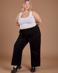 Juliet is 5'8" and wearing 1XL Organic Action Pants in Basic Black
