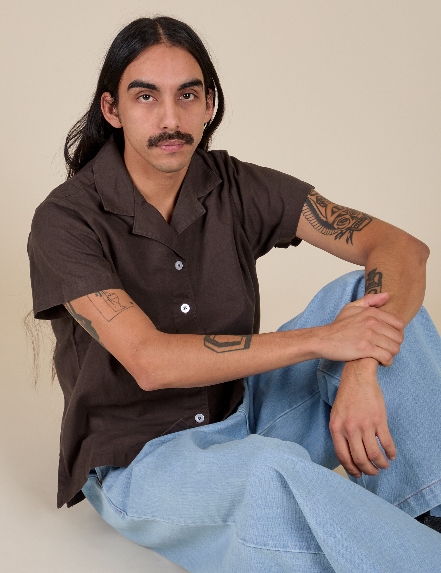 Anthony is wearing Pantry Button-Up in Espresso Brown