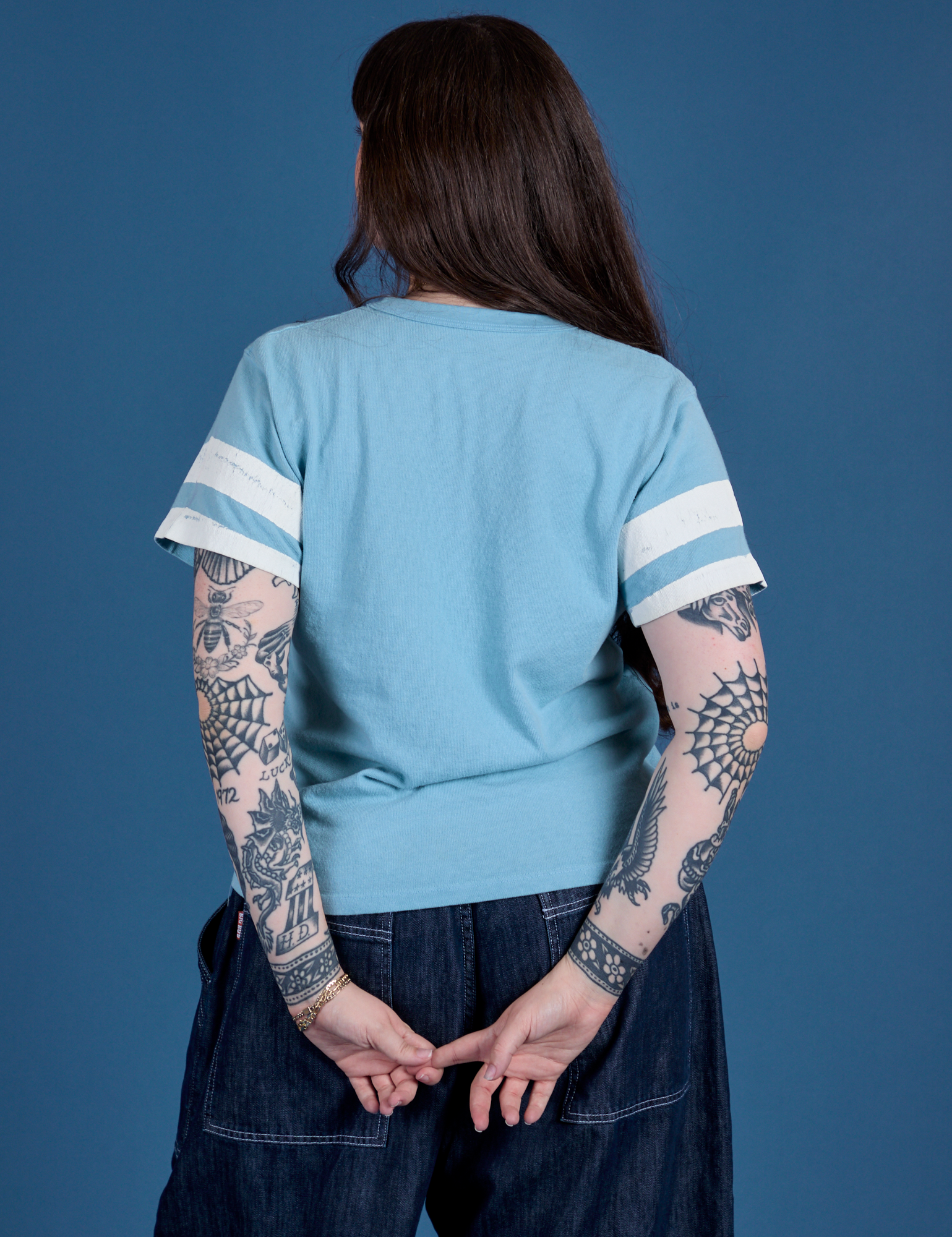 Painted Burly Tee in Baby Blue back view on Sydney