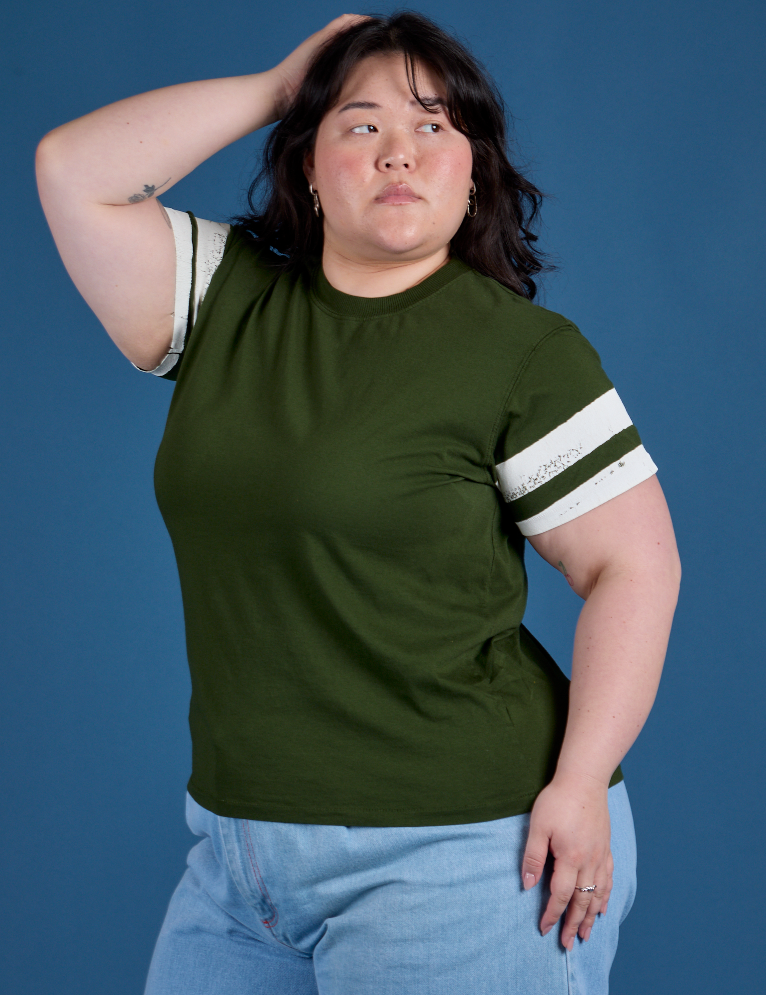 Angled front view of Painted Vintage Tee in Evergreen on Ashely