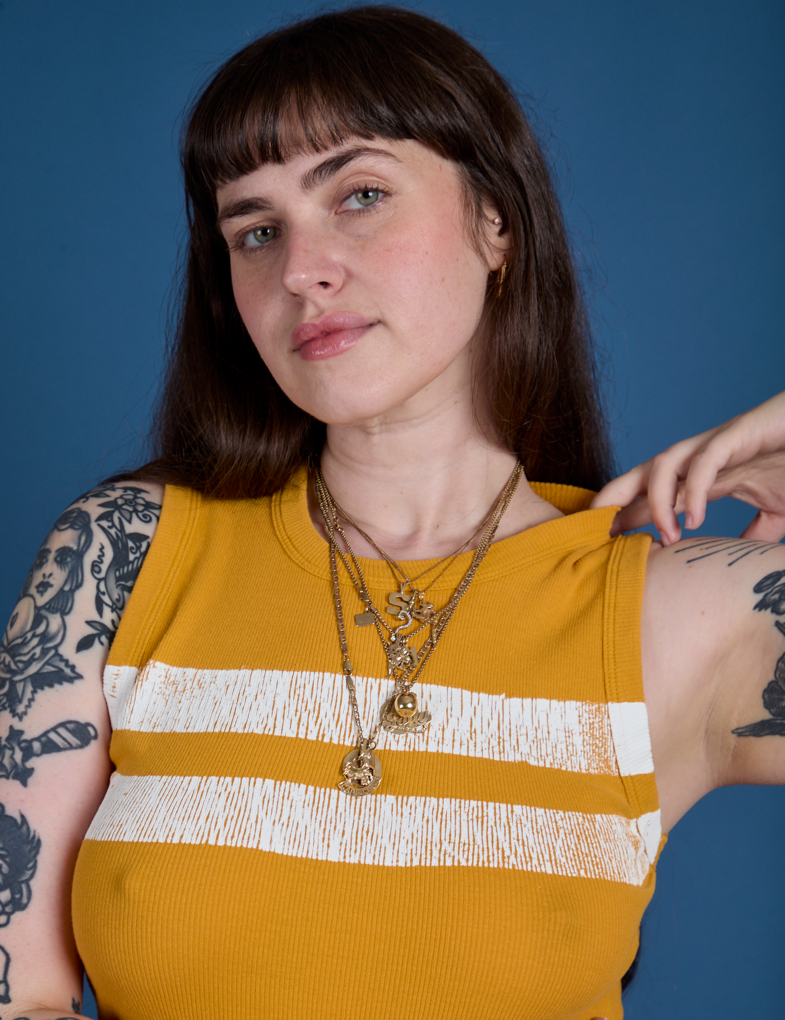 Front close up of Painted Muscle Tee in Mustard Yellow on Sydney