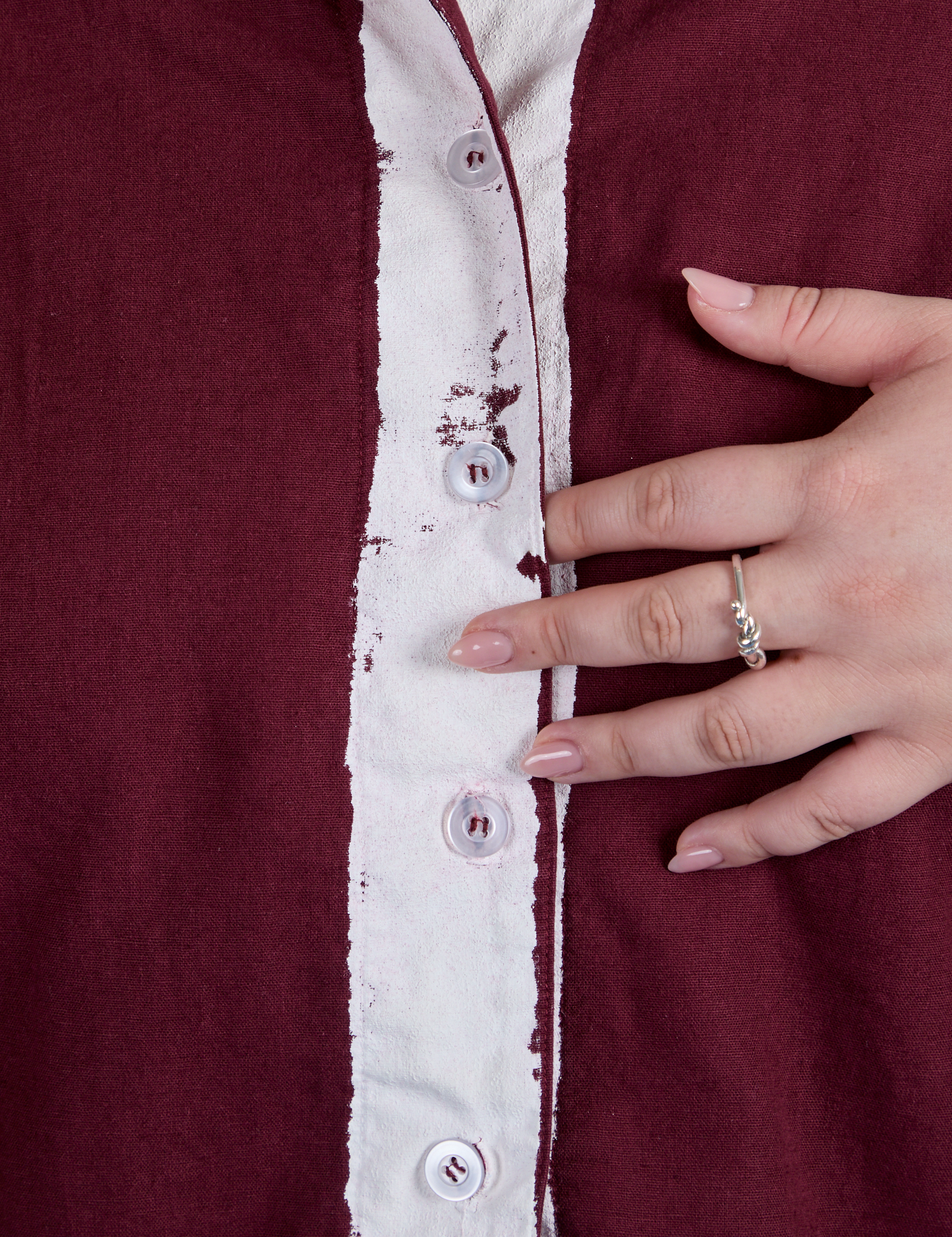 Close up of button placket of Painted Pantry Button-Up in Red Wine on Ashley