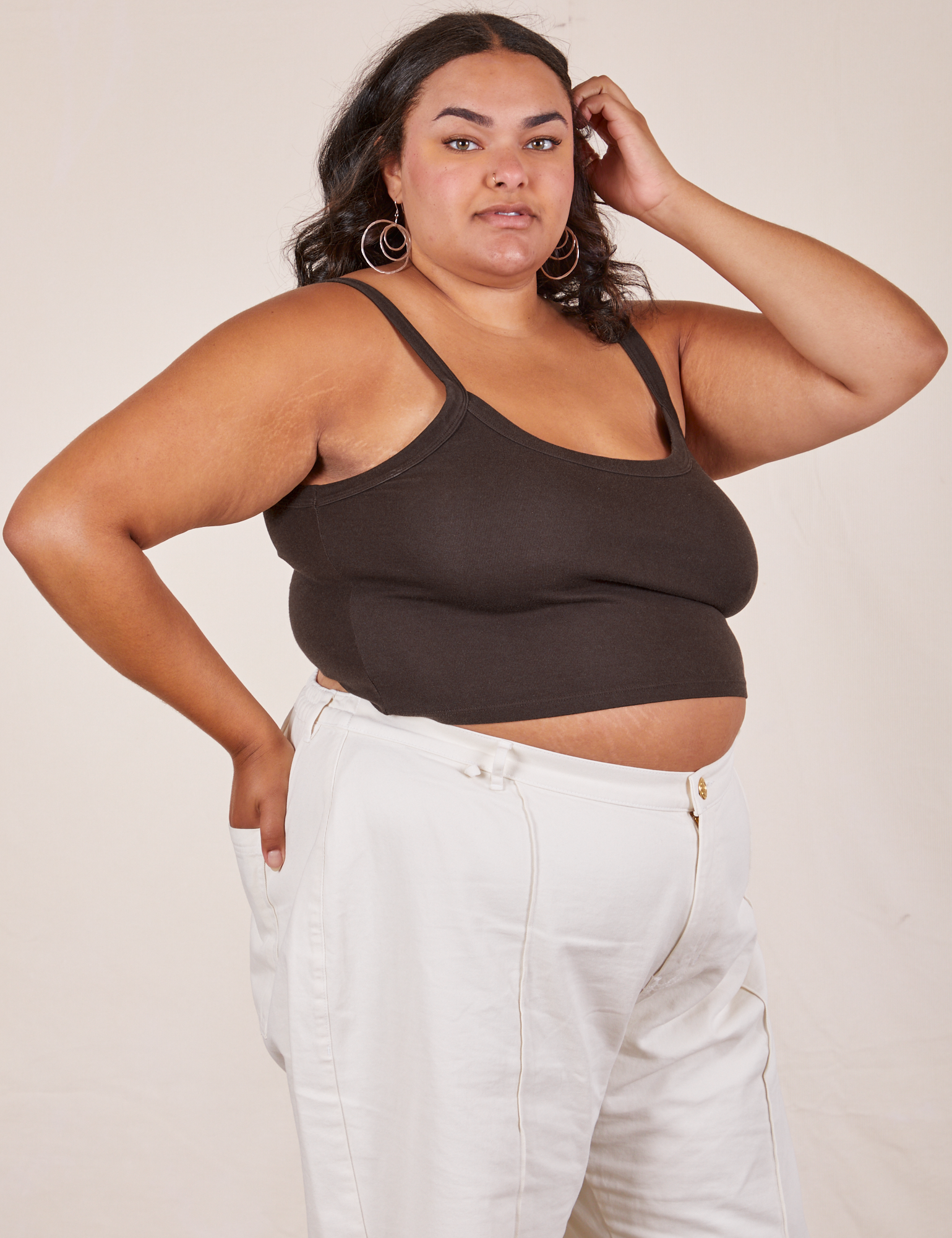 Angled view of Cropped Cami in Espresso Brown and vintage tee off-white Western Pants worn by Alicia