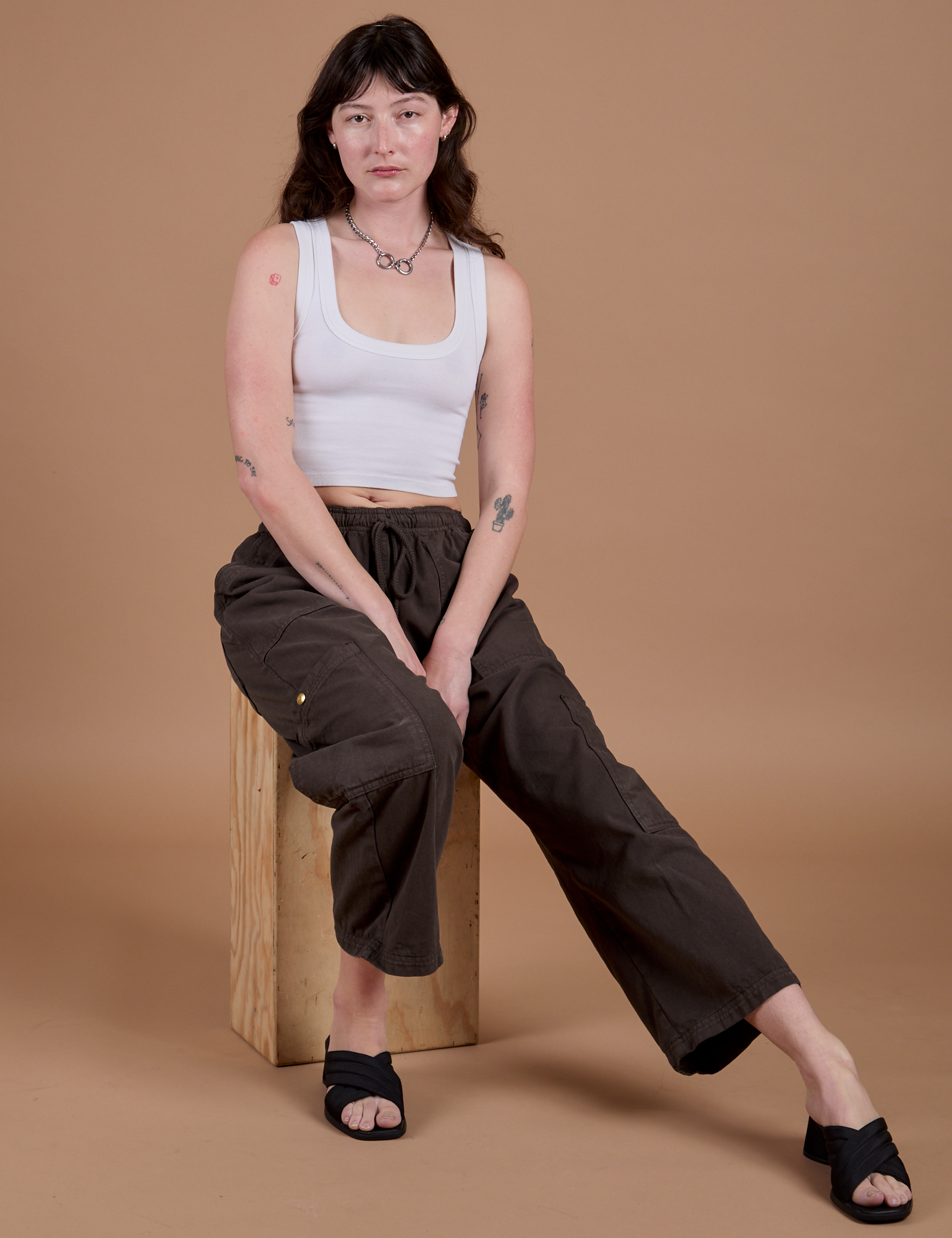 Drop Pocket Cargo Pants in Espresso Brown and vintage tee white Cropped Tank on Alex