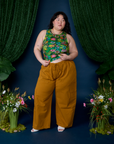 Ashley is wearing Pond Party Racerback Tank paired with spicy mustard Drop Pocket Cargo Pants