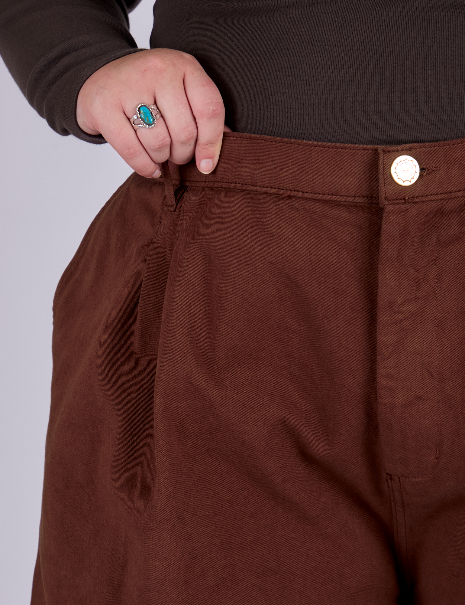 Pleated Trouser Shorts in Fudgesicle Brown front close up on Juliet