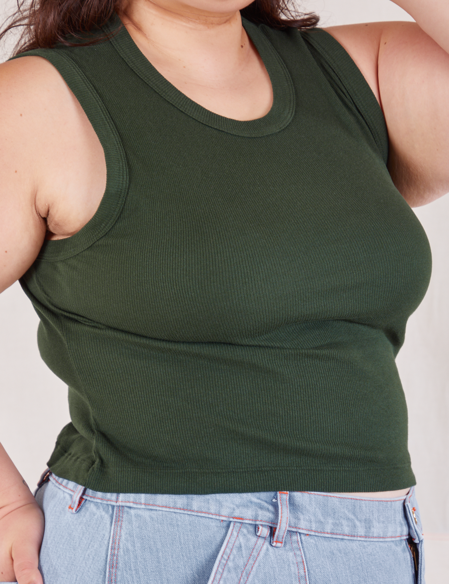 Muscle Tee in Swamp Green close up on Ashley