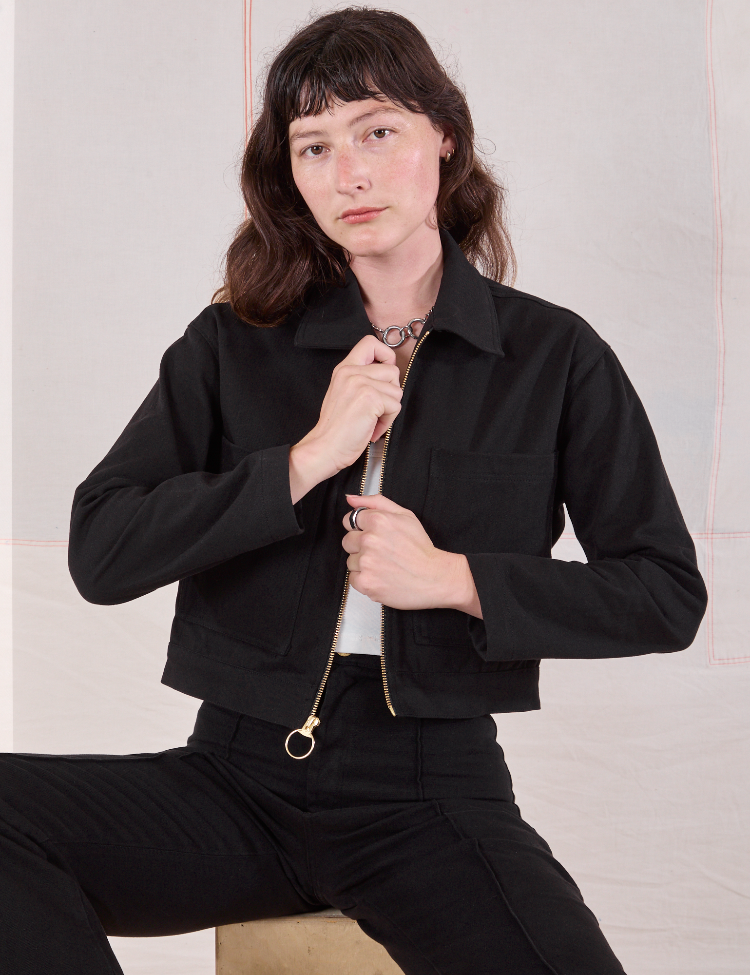 Alex is 5’8” and wearing P Mechanic Jacket in Basic Black