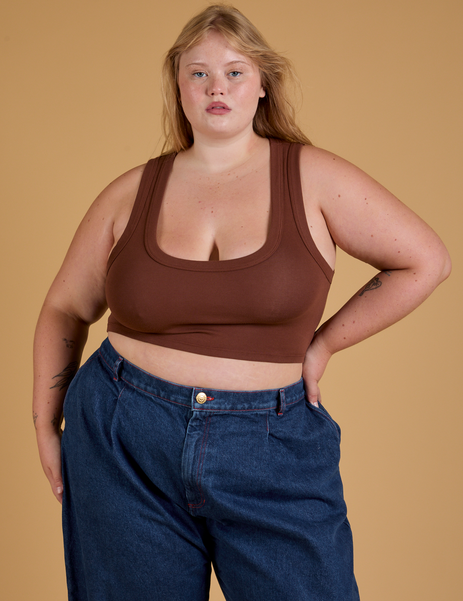 Juliet is 5’7” and wearing L Mini Tank in Fudgesicle Brown