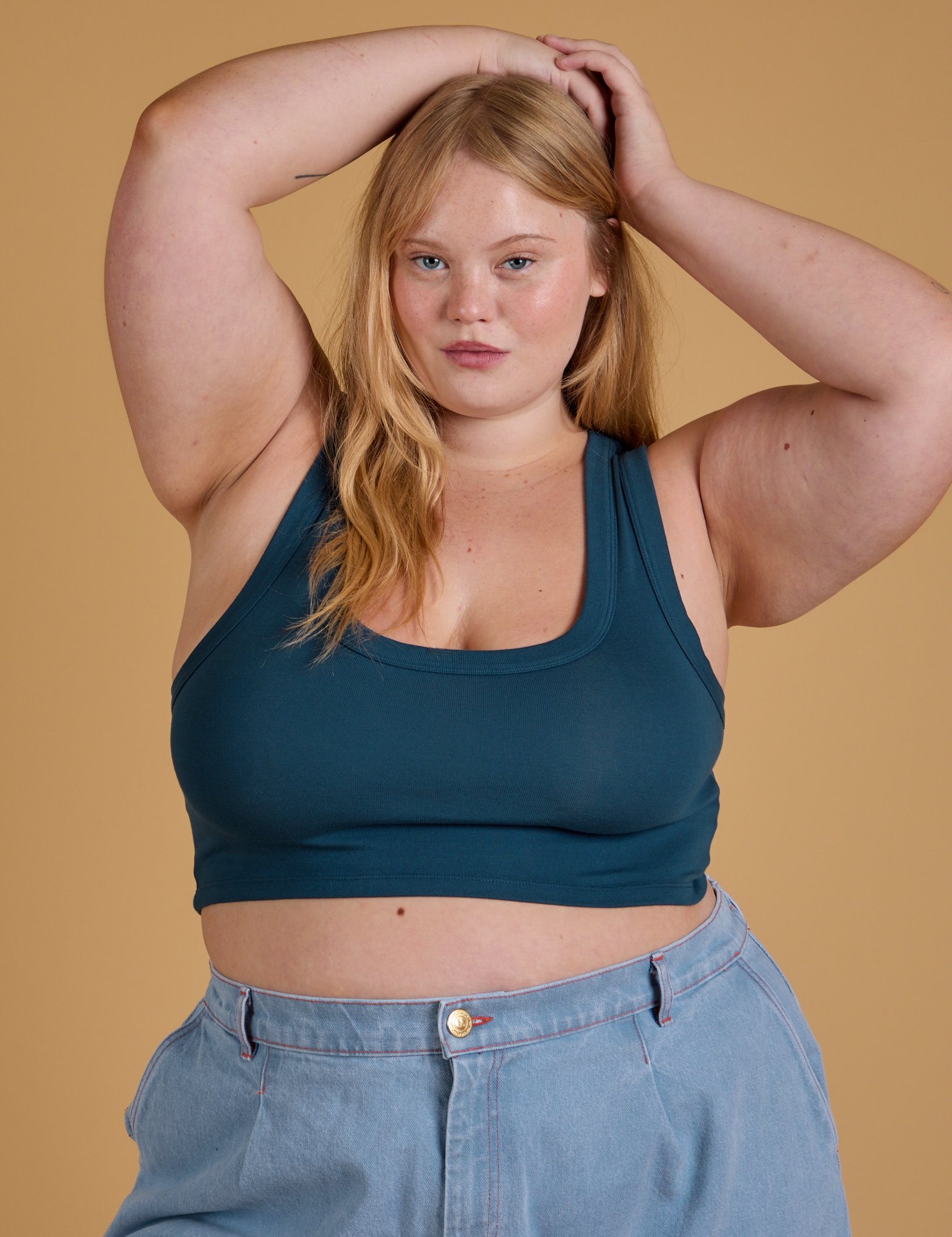Juliet is 5’7” and wearing L Mini Tank in Lagoon