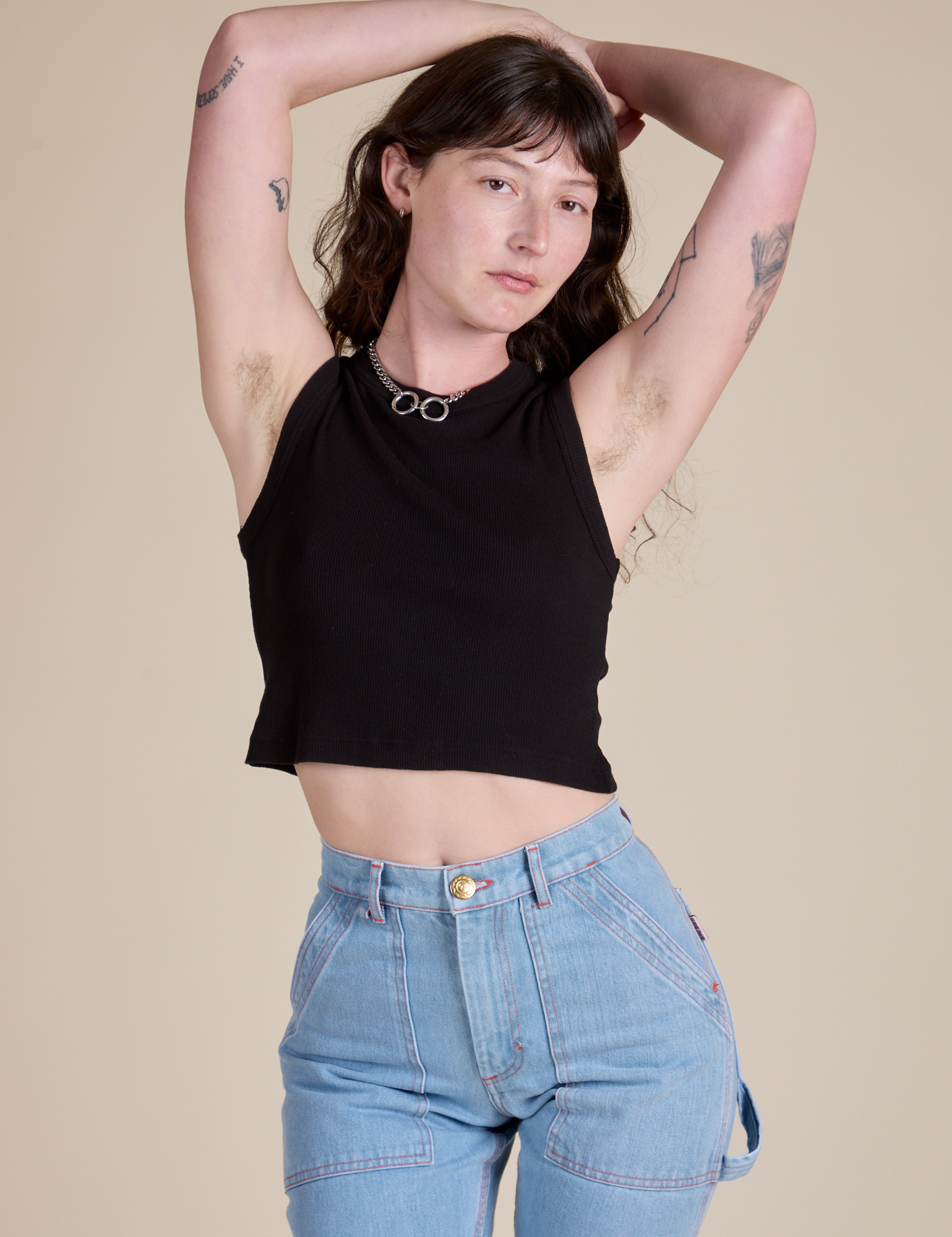 Alex is 5’8” and wearing P Muscle Tee in Basic Black