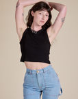 Alex is 5’8” and wearing P Muscle Tee in Basic Black