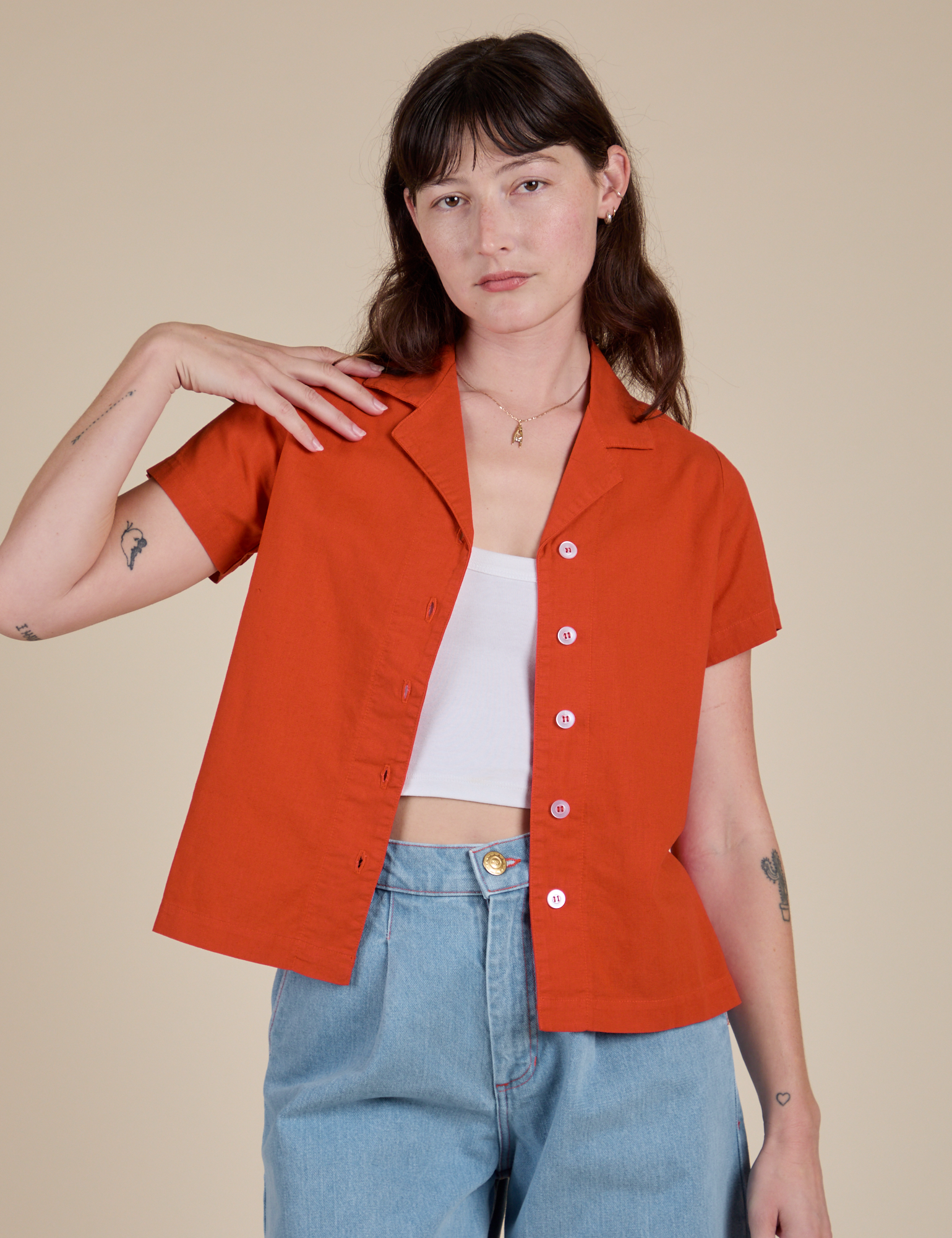 Alex is 5’8” and wearing P Pantry Button-Up in Chili Red