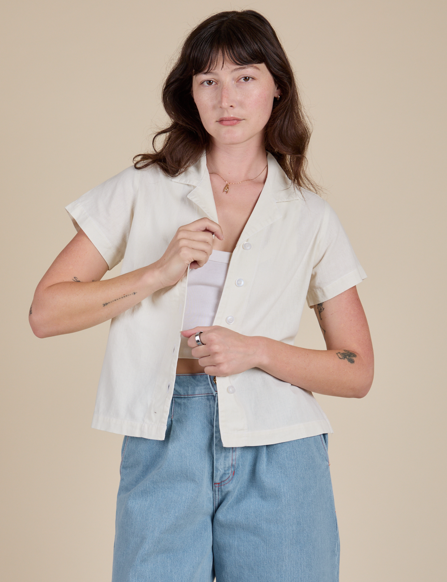 Alex is 5’8” and wearing P Pantry Button-Up in Vintage Tee White