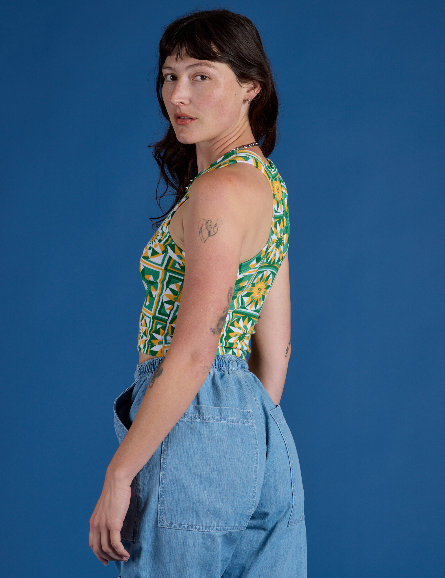 Deep-Cut Racerback Tank in Spring Quilt Print side view on Alex
