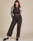 Sydney is wearing Racerback Tank in Espresso Brown and matching Work Pants