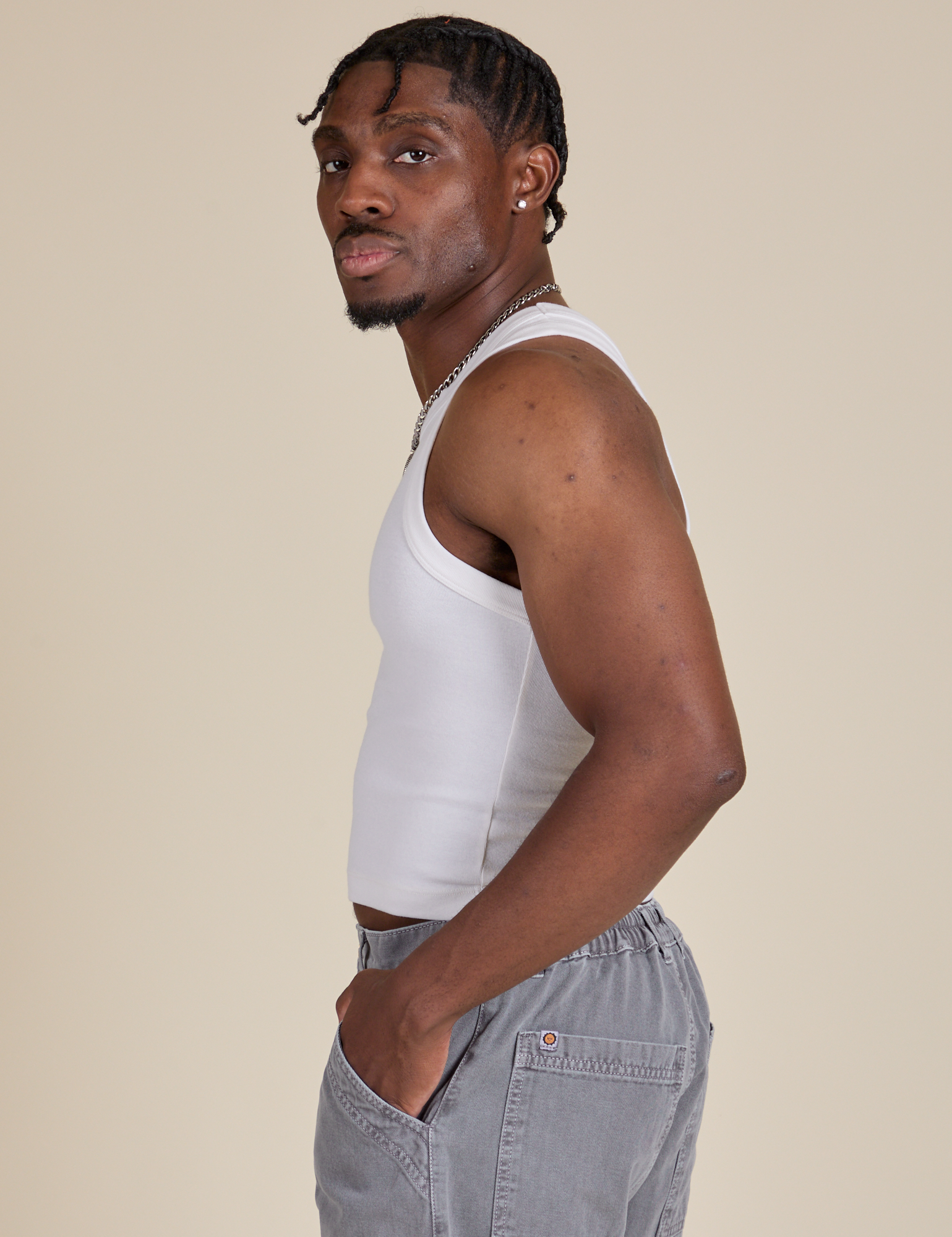 Racerback Tank in Vintage Tee White side view on Isaac