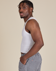 Racerback Tank in Vintage Tee White side view on Isaac