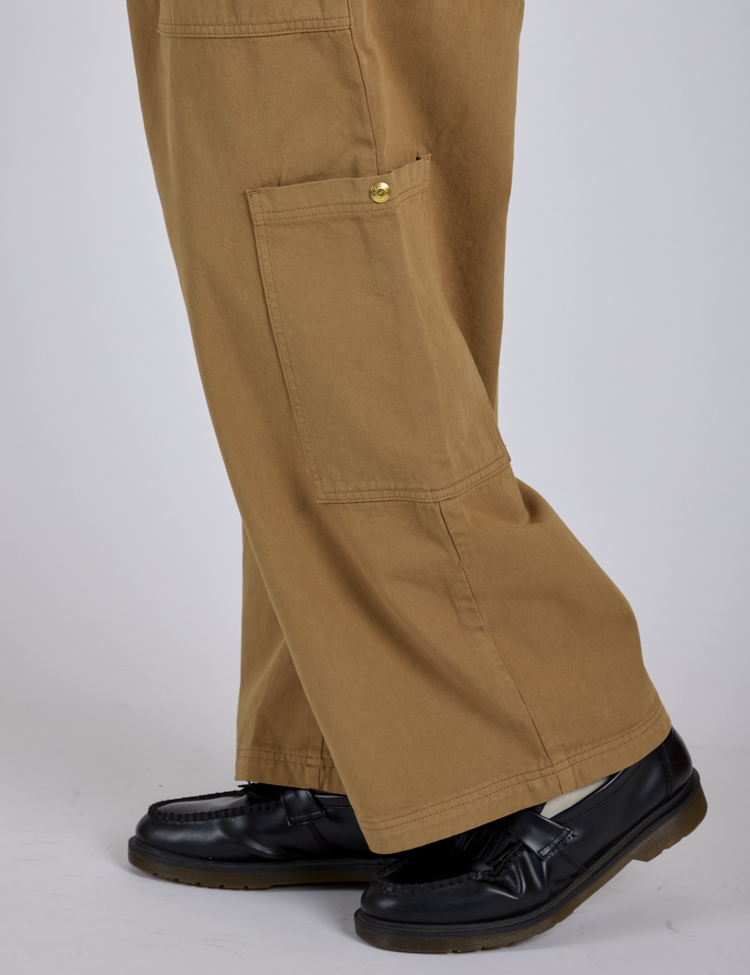Side view close up of Drop Pocket Cargo Pants in Desert Brown pant legs on Isaac