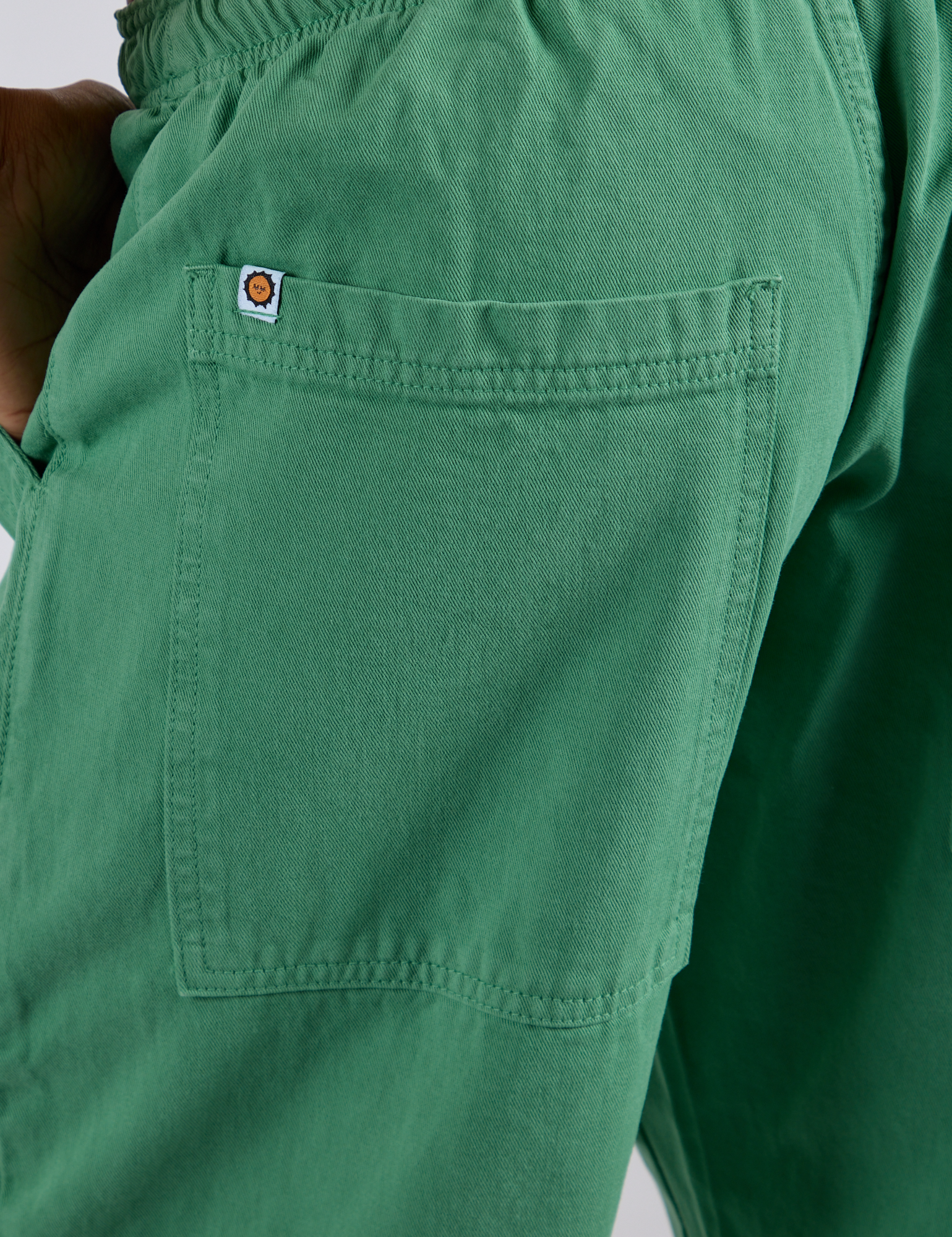 Close up of Drop Pocket Cargo Pants in Seafoam Green back pocket