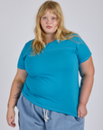 Juliet is 5’7” and wearing L Jr. Varsity Tee in Hawaiian Blue 