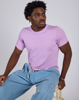 Jr. Varsity Tee in Lilac Purple worn by Isaac