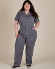 Ashley is 5'7" and wearing 1XL Short Sleeve Jumpsuit in Washed Grey