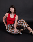Striped Drop Pocket Pants in Retro Rainbow and mustang red Tank Top worn by Alex