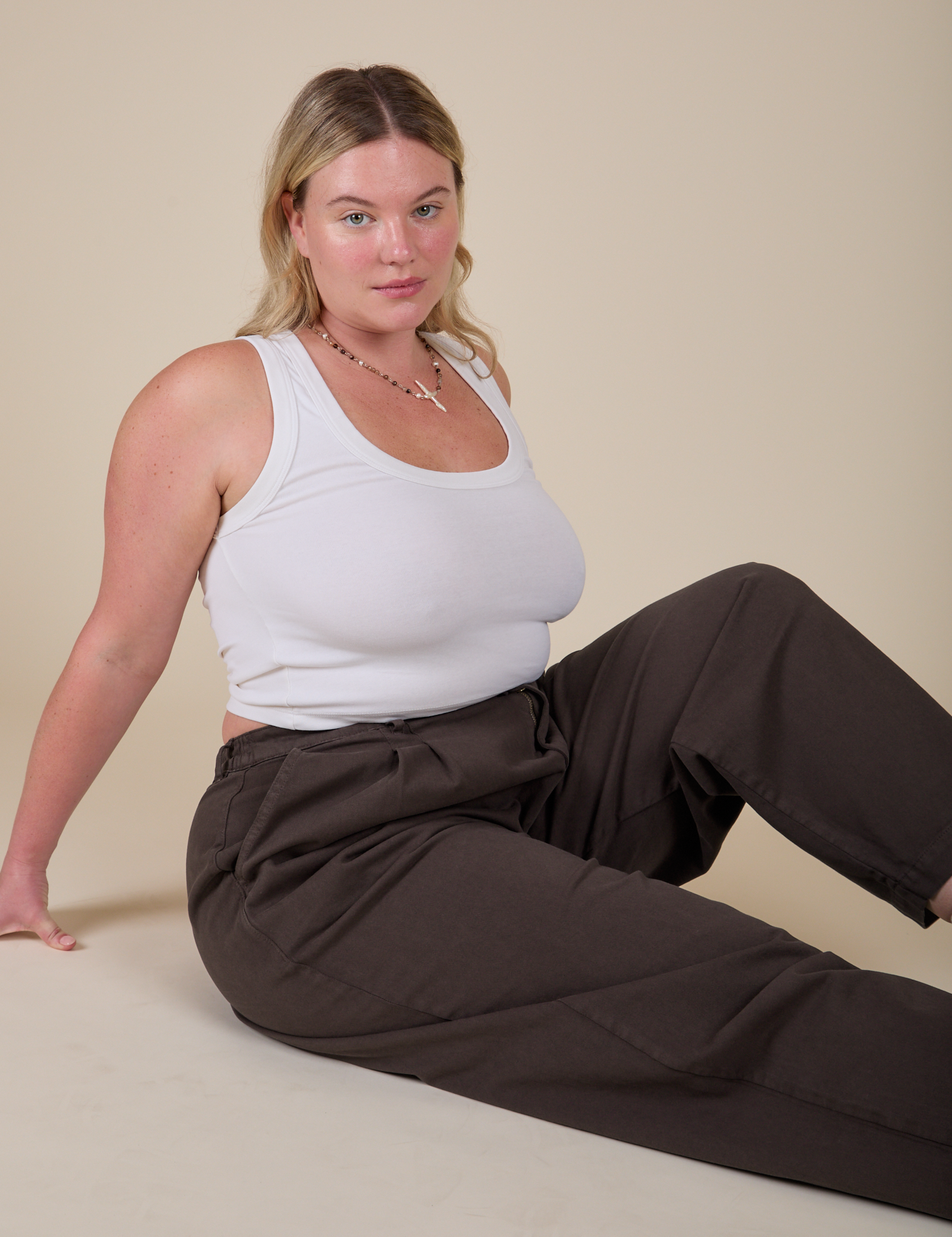 Lish is wearing Heavyweight Trousers in Espresso Brown and vintage tee white Cropped Tank