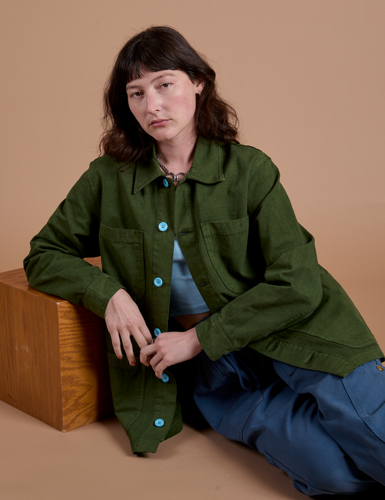 The Ripstop Field Coat in Evergreen is worn by Alex
