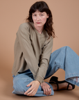 Alex is wearing Long Sleeve Burly Tee in Khaki Grey