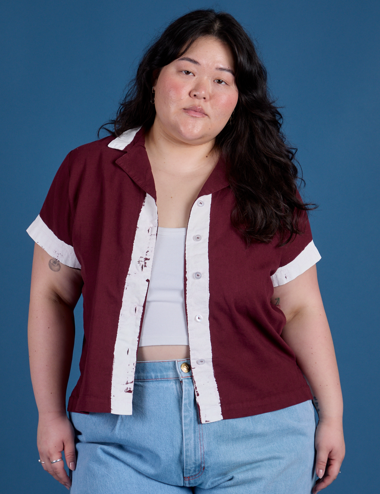 Ashley is wearing Painted Pantry Button-Up in Red Wine