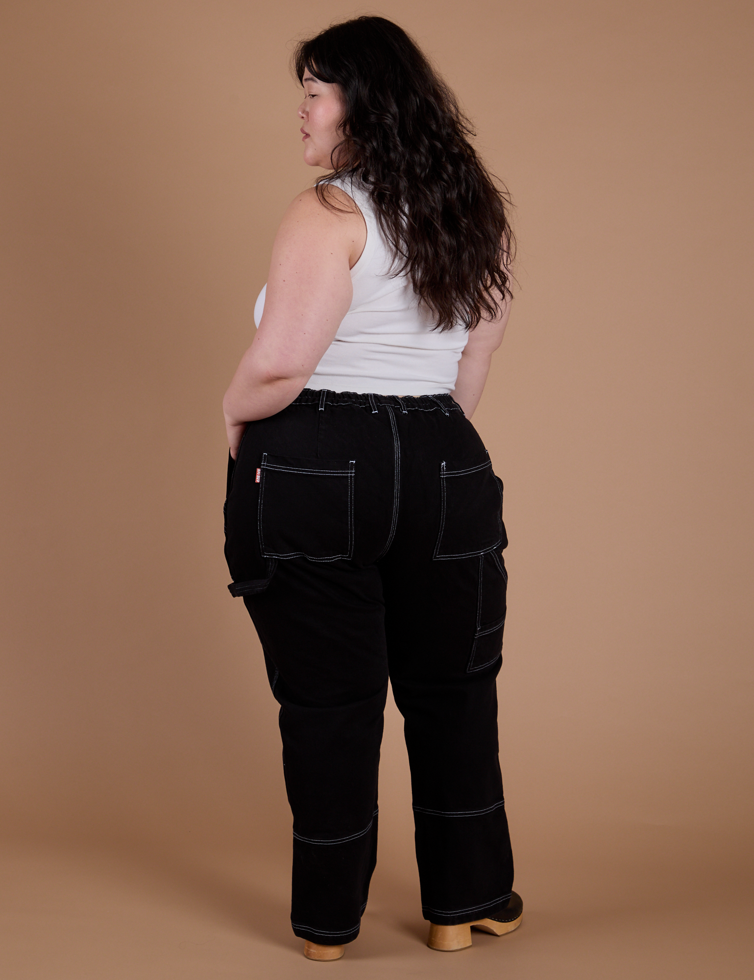 Back view of Carpenter Jeans in Black on Ashley