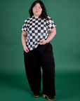 Ashley is wearing Checker Organic Tee in Black and black Drop Pocket Cargo Pants
