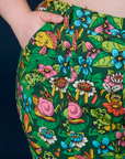 Close up of Ashley's hand in the front pocket of Work Pants in Pond Party