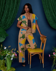 Kandia is 5'3" and wearing P Paintstamped Pantry Button-Up in Froggy and matching Work Pants