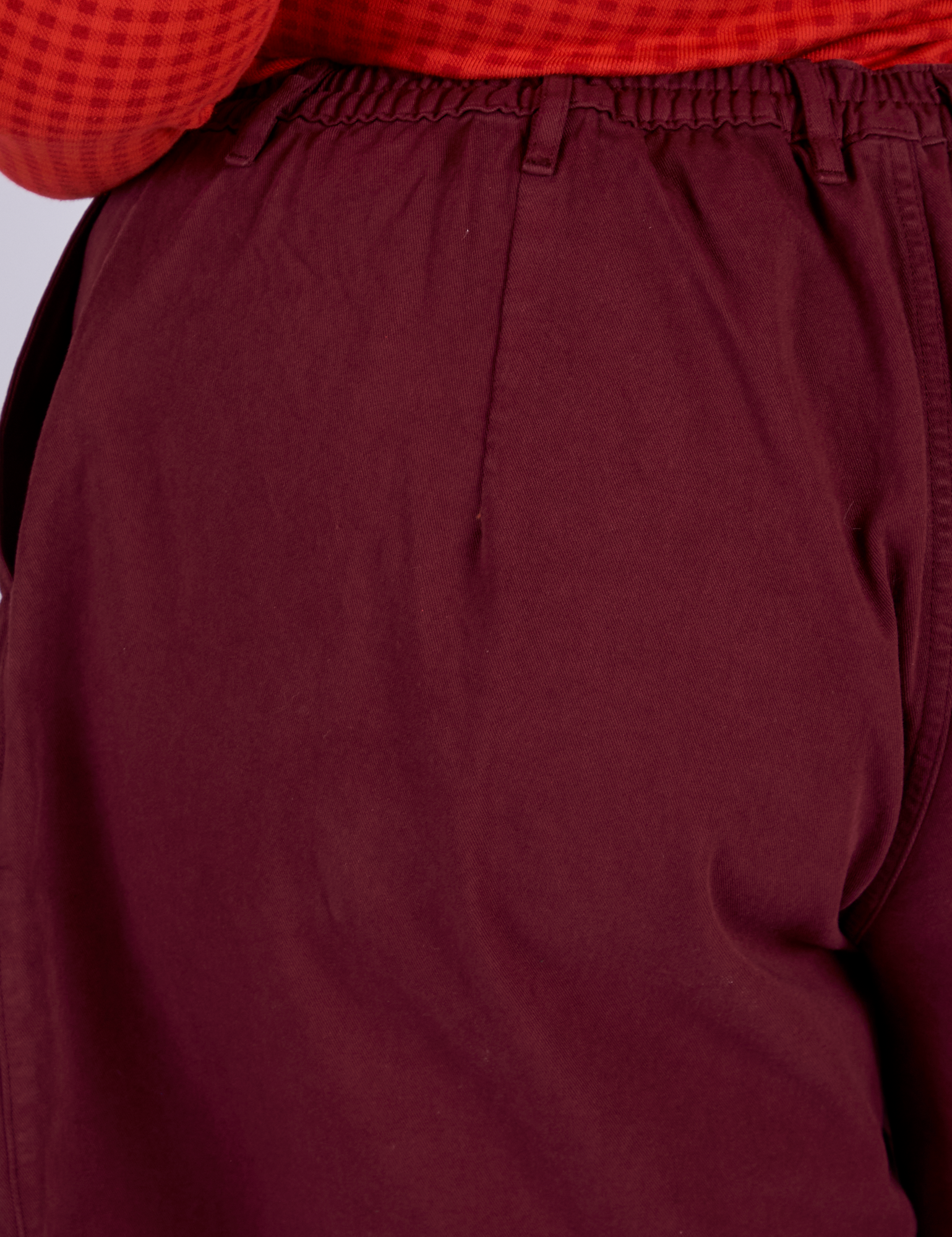 Pleated Trouser Shorts in Red Wine back view close up on Juliet