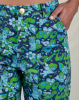 Close up of Shahana's hand in the front pocket of Work Pants in Angel Print