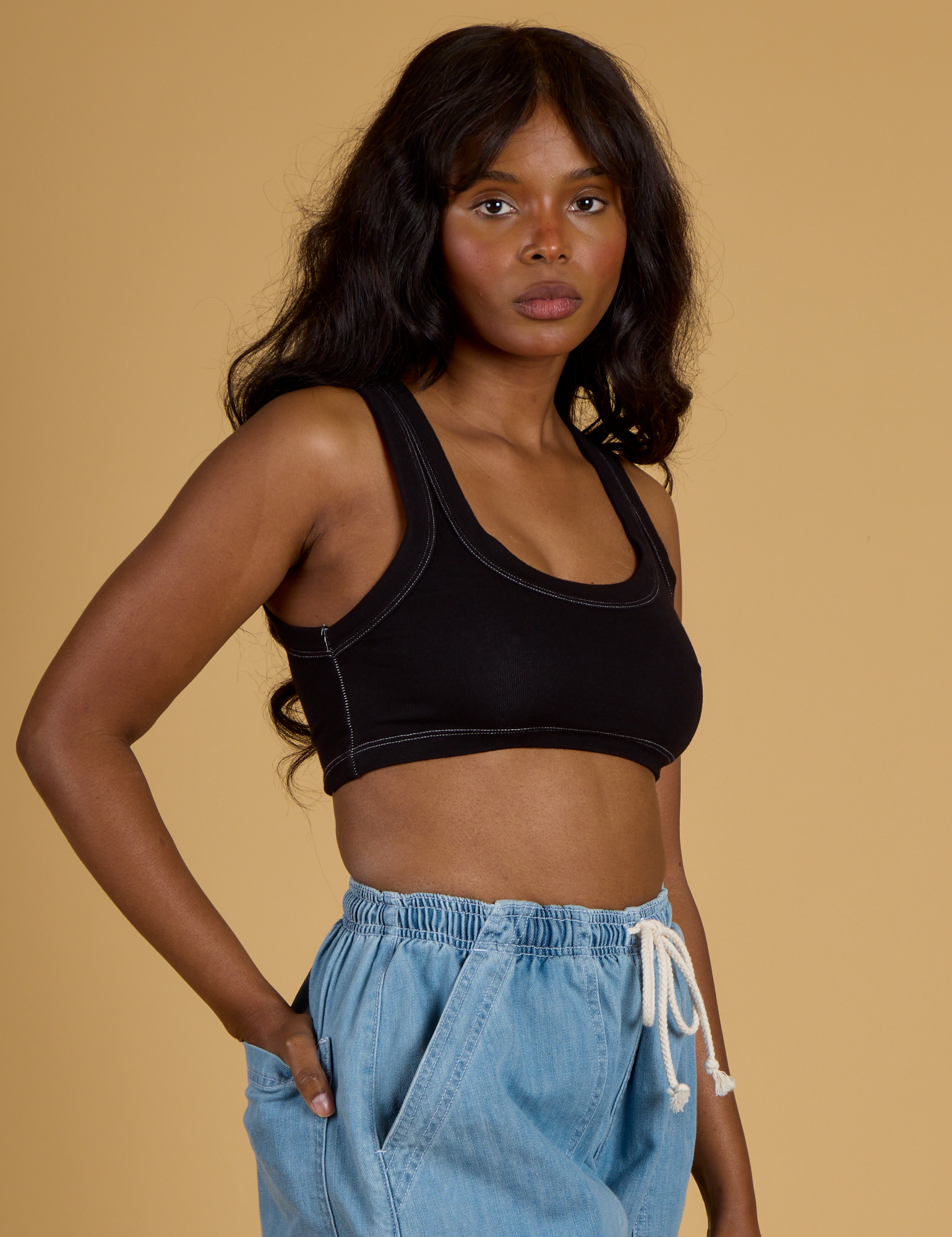 Contrast Stitch Mini Tank in Basic Black angled front view on Kandia