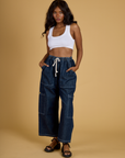 Kandia is wearing Contrast Stitch Mini Tank in Vintage Tee White paired with dark wash Denim Drop Pocket Pants