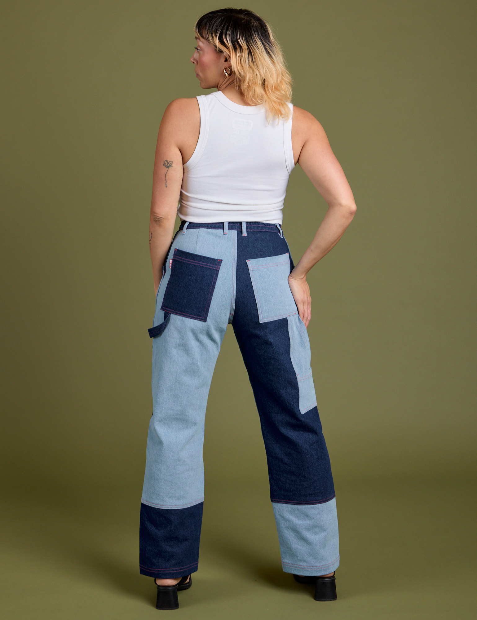 Back view of Mismatched Denim Carpenter Jeans and Cropped Tank in Vintage Tee White on Tiara